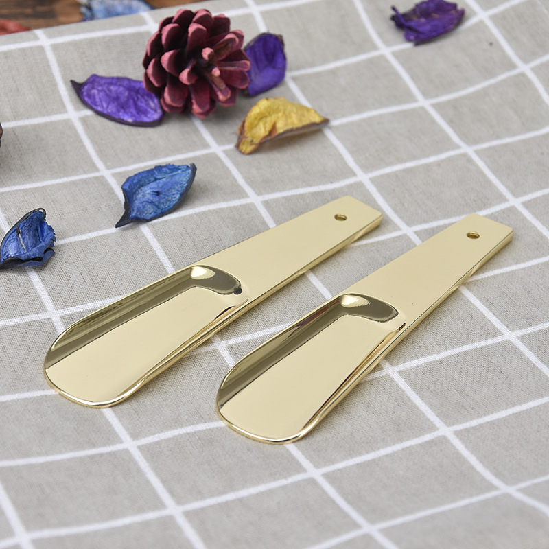 Zinc alloy shoehorn, ravna drška, Autonomy marka, pakiranje 250 kom., neto težina 0,12 kg