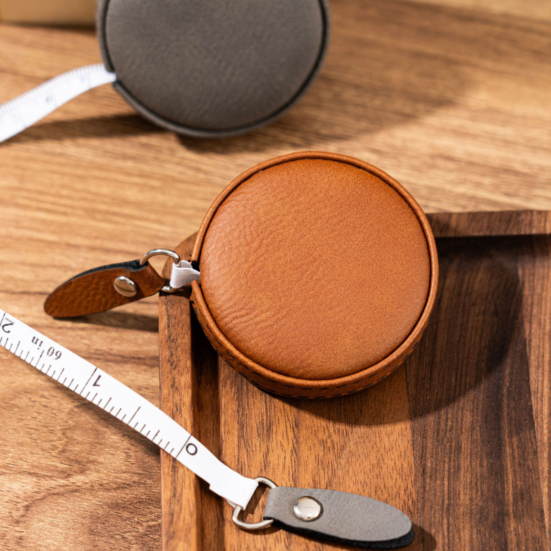 PU kožna mjernа traka s automatskim povlačenjem, graviranje moguće, prijenosna, raspon mjerenja 0-150 cm