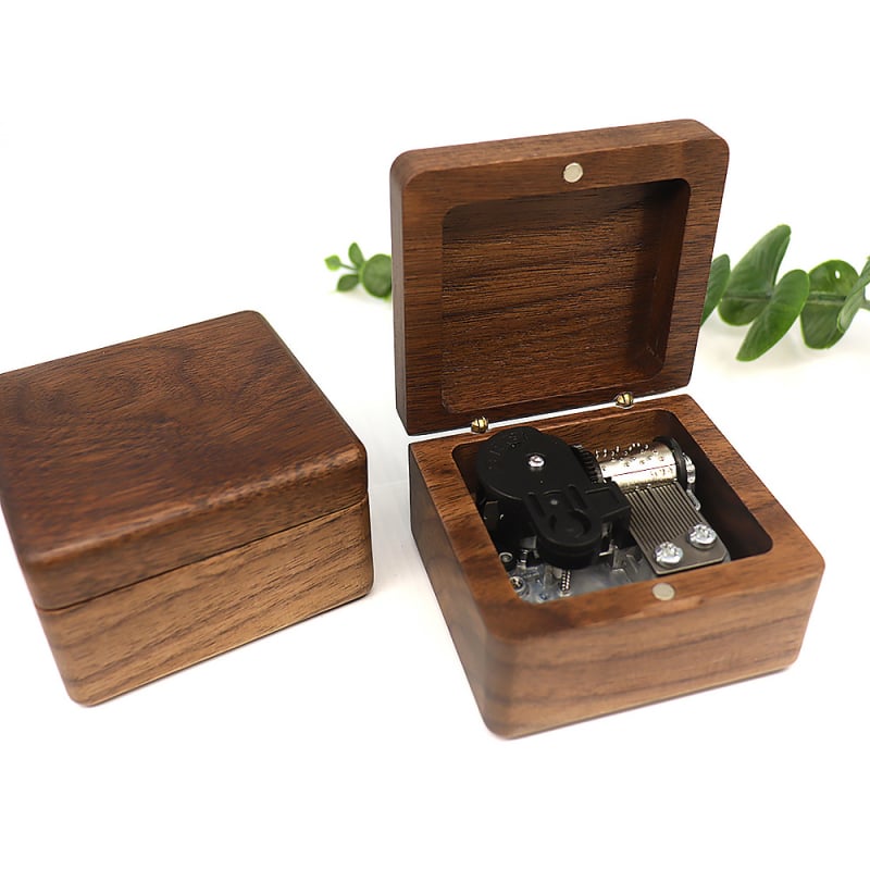 Ξύλινο διακοσμητικό μουσικό κουτί από μαύρη καρυδιά, γλυπτό σχέδιο, δυνατότητα προσαρμογής και εκτύπωσης λογότυπου, απλός μοντέρνος σχεδιασμός