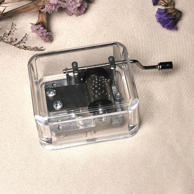 Κουτί μουσικής με χειροκίνητο γύρισμα – μεταλλικό περίβλημα, μηχανισμός χύτευσης με έγχυση, εκτύπωση λογότυπου, χωρίς δικαιώματα IP