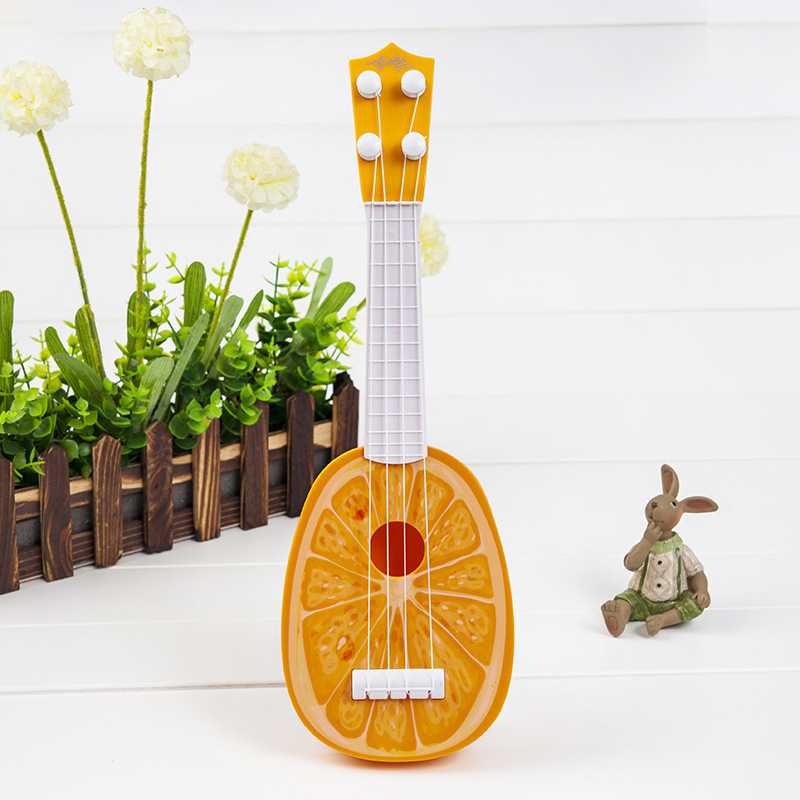 Dječja igračka gitara u obliku voća, mini ukulele; plastični okvir; marka Fag Bear; kategorija: Gitara/Bass; 3C: Druge igračke do 14 godina; dob 0–14