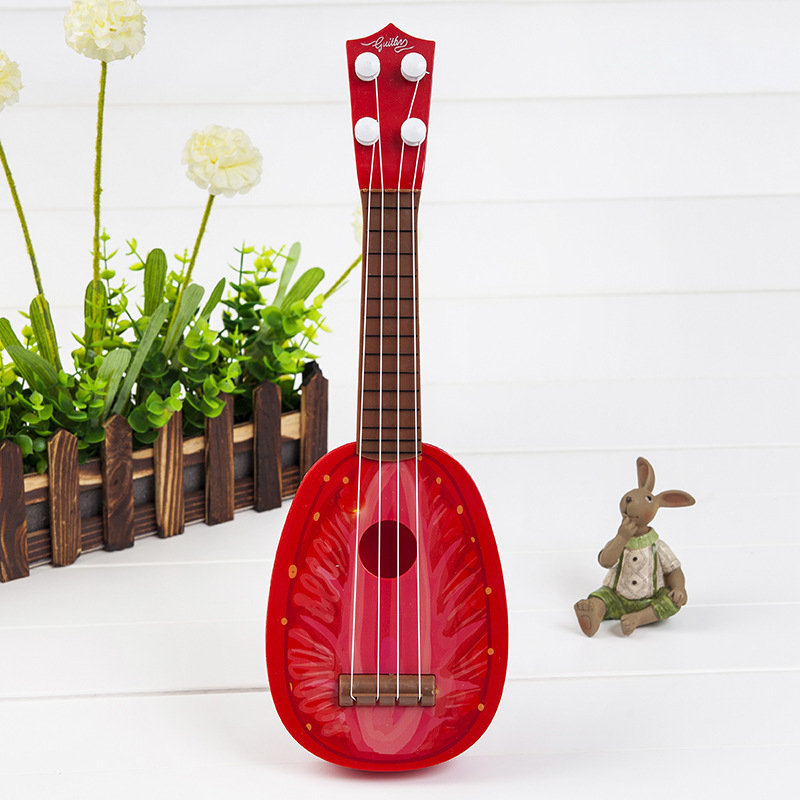 Dječja igračka gitara u obliku voća, mini ukulele; plastični okvir; marka Fag Bear; kategorija: Gitara/Bass; 3C: Druge igračke do 14 godina; dob 0–14