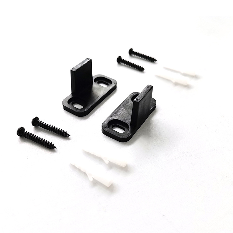 Swing stopper za vrata stila barn door, materijal POM, podno montiranje, ručno upravljanje, marka Johnson