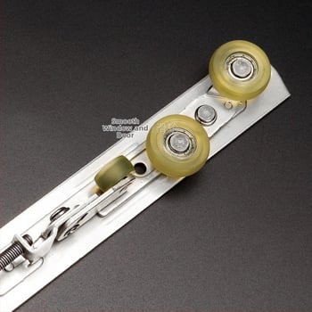 Felső görgő ajtókhoz és ablakokhoz – csúszóajtókhoz, taifun-ellenálló, anti‑ugrás, anti‑sviriből rugóval, rozsdamentes acél, modell Hllsf-020-typhoon wheel