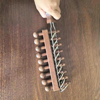 Kilenc gyűrűs fa puzzle a türelem gyakorlásához — Kategória: Kilenc gyűrű; Csomagolás: átlátszó blister; Testreszabás: OEM logó