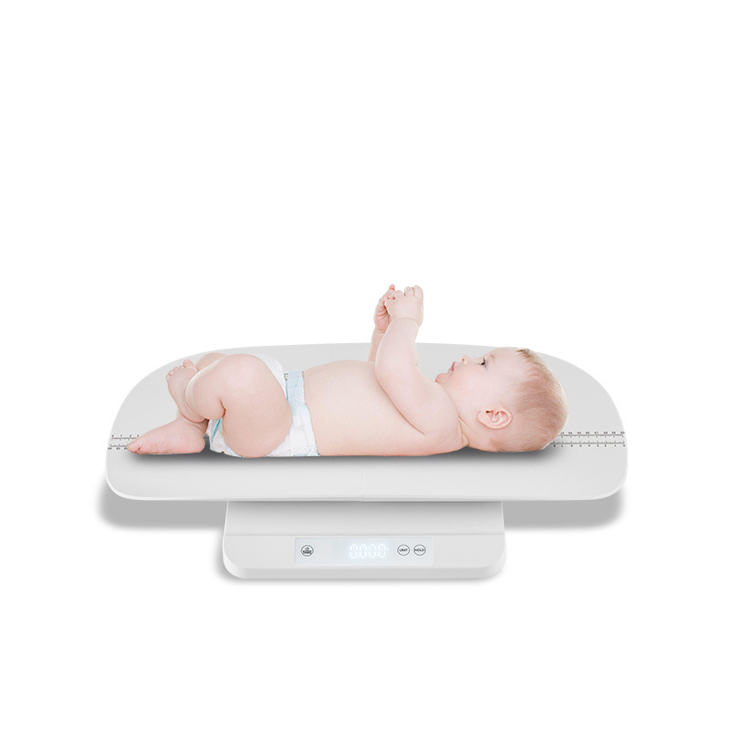 Elektronska vaga s podijeljenom konstrukcijom za kućnu upotrebu – mjere odrasle, djecu, bebe i male kućne ljubimce; kapacitet 100 kg; napajanje baterijom/USB; minimalistički stil.