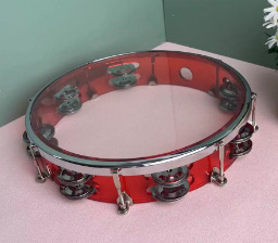 Tamburin Orff instrument, proziran, podesiv dvostruki red; plastično kućište; težina 498–508 g; prikladno za uzrast 7–14 godina