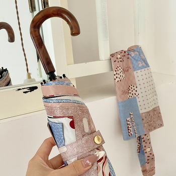 Puzzle‑oblik sklopivi kišobran s kukom, za sunce i kišu (UPF 30+, tkanina 190T, vlaknaste rebra, željezna šipka, ručno otvaranje/zatvaranje)