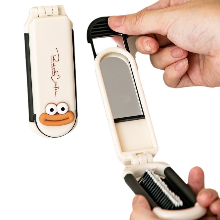 Sklopivi mini češalj s zračnim jastučićem i integriranim ogledalom – prijenosni, kompaktni dizajn