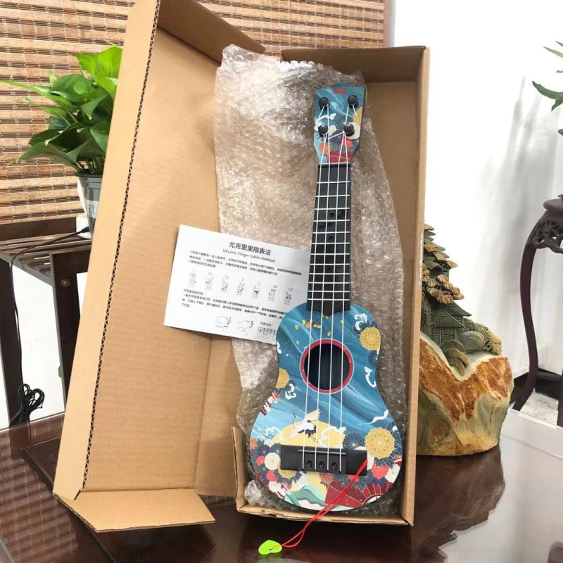 Dječja ukulele u nacionalnom stilu – plastična igračka gitara, podrijetlo Guangdong Shantou, za 0–3 godine, interaktivno učenje