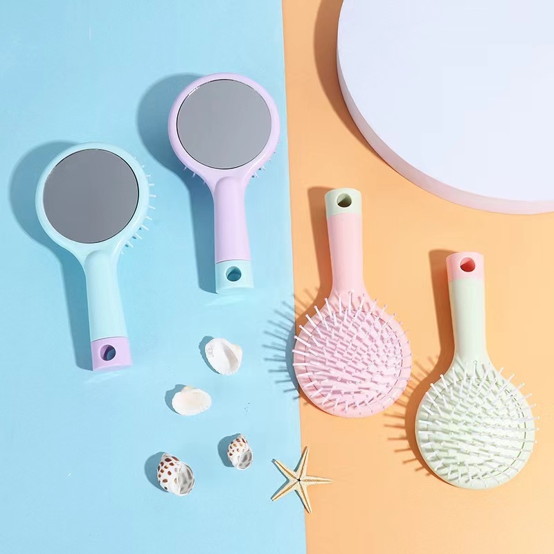 Légpárnás tükrös fésű – integrált masszázs funkcióval, PP fogantyú és nylon tűk