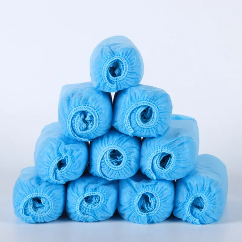 Egyszer használatos nemszövött cipővédők, 0,03 mm vastagság, porvédő és csúszásmentes, 100 db csomag