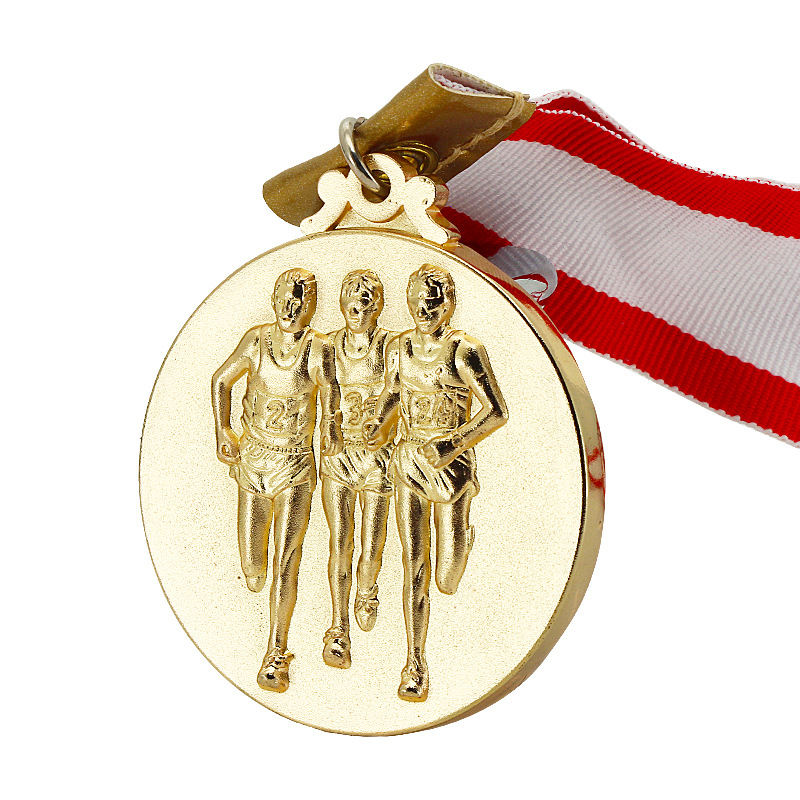 Medalie din aliaj de zinc cu finis aurit; posibilitatea personalizării siglei; premiu comemorativ autorizat.