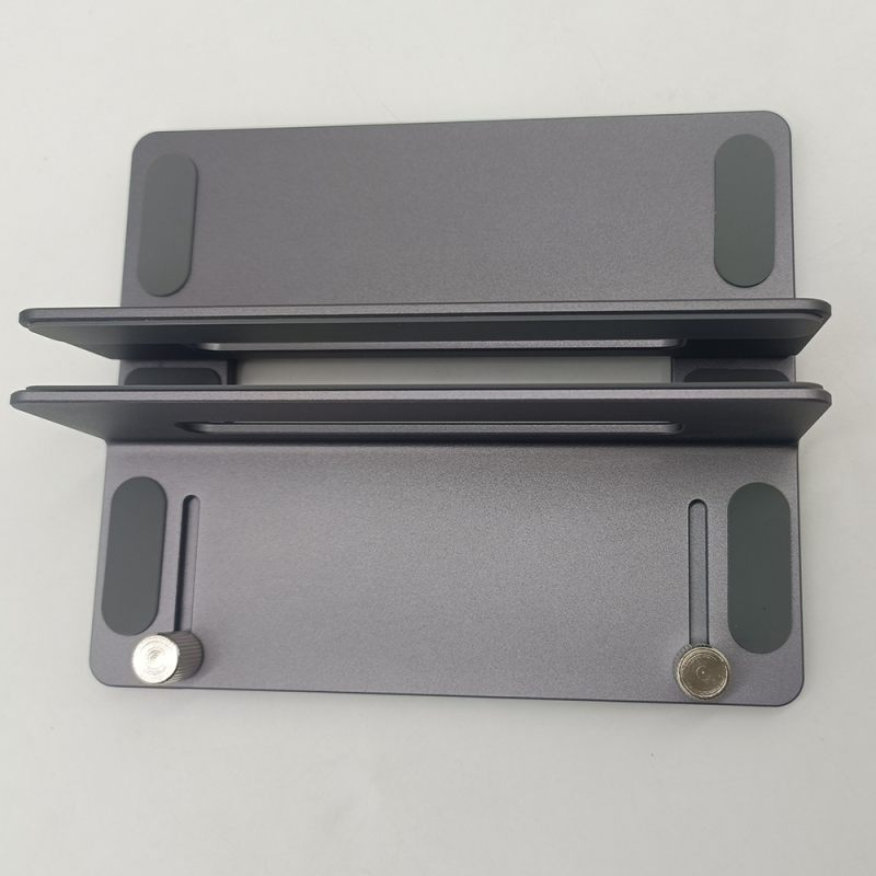 Suport vertical pentru laptop și Mac mini M4 — aliaj de aluminiu; model: suport vertical; compatibilitate generală; lansat în 2024; greutatea variază în funcție de numărul de cleme: unu sau două