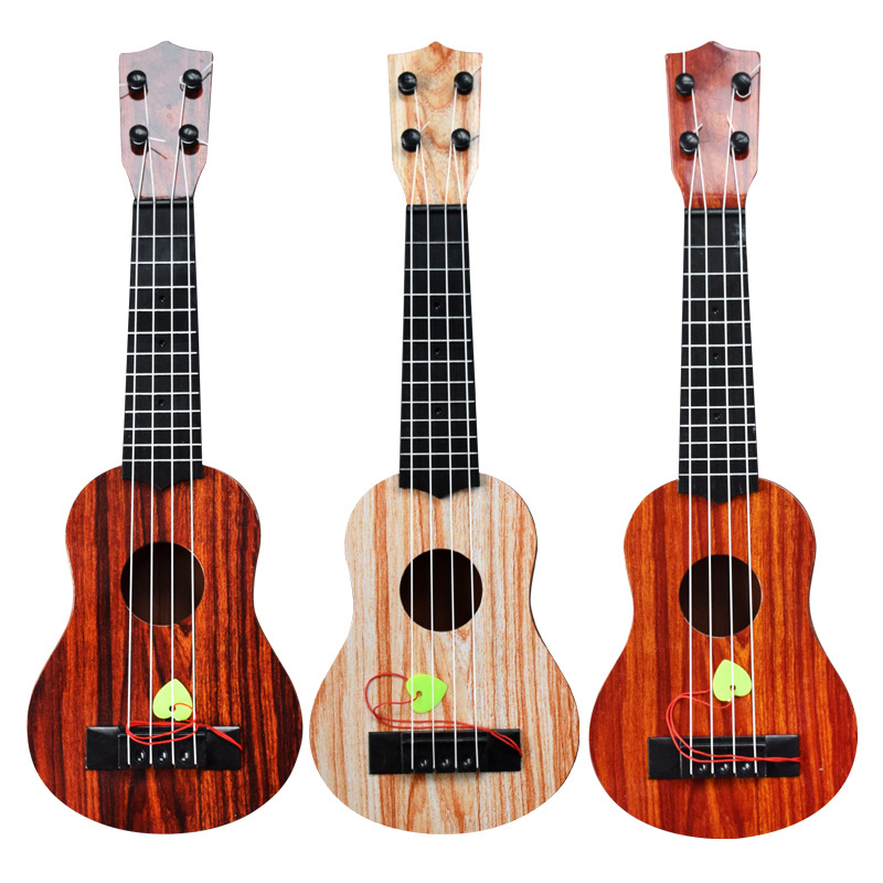 Dječja ukulele igračka od plastike, brend UNE LUCIOLE, model dhf-6, za uzrast 7–14 godina