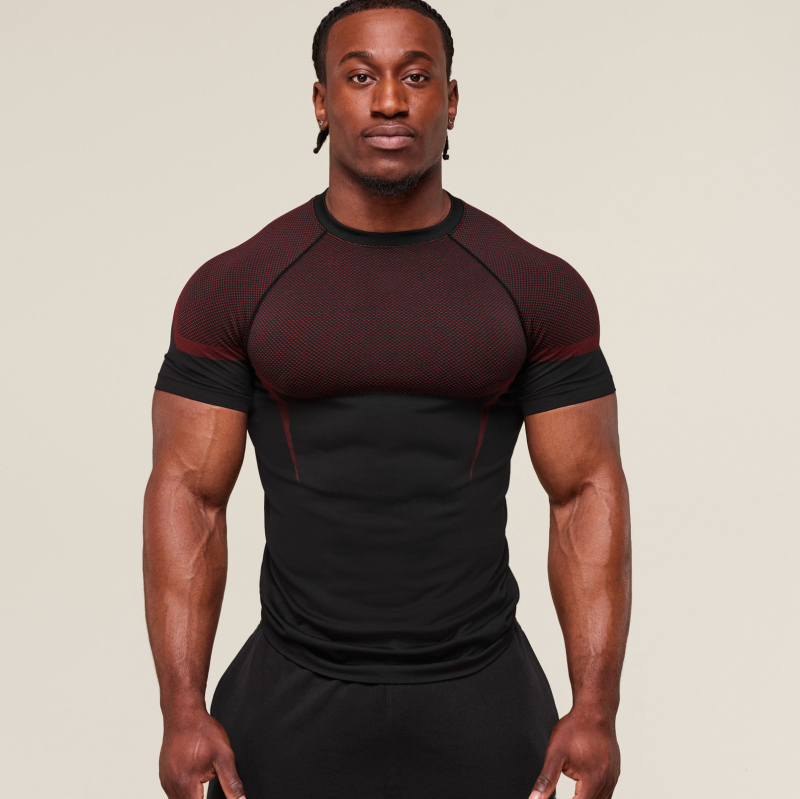 Férfi edzőpóló lazán szabott, poliészter, kerek nyakú, rövid ujjú, légáteresztő