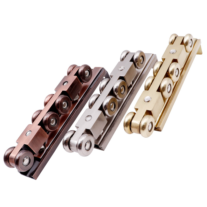 Kladka za klizna vrata – cinkova legura, 4 metalna kotačića, nosivost do 200 kg, za čvrsta drvena vrata