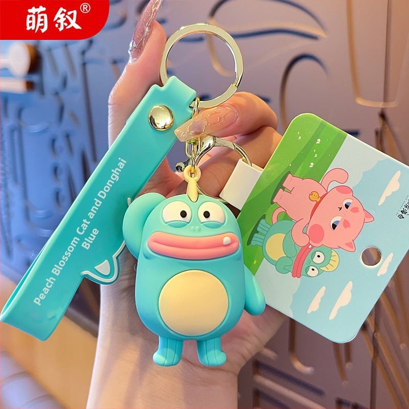 Privjesak za ključeve: mačka s breskvinim cvijetom i Donghai ribom, crtani PVC, sladak stil, individualno pakiranje