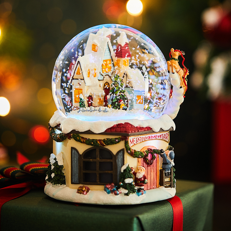 Točiaca sa snehová kryštálová guľa – Bluetooth hudobná skrinka so saténovým kvetom, osem melódií