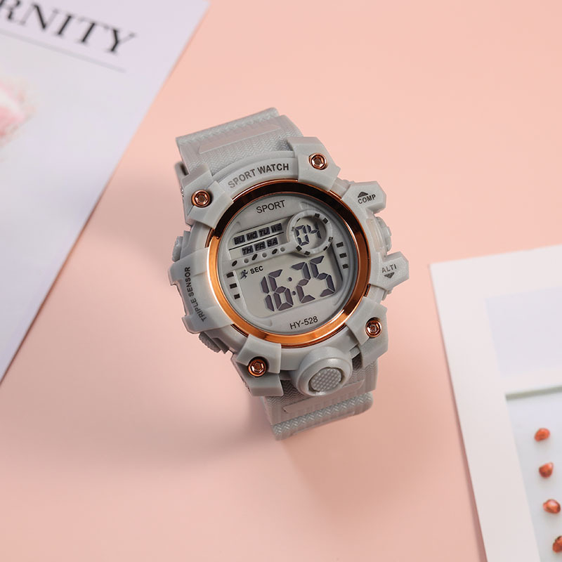 Unisex multitfuncionalni LCD digitalni sat za studente - otporan na vodu 10m, elektronički pogon, okrugli brojčanik, plastično kućište i plastični kaiš