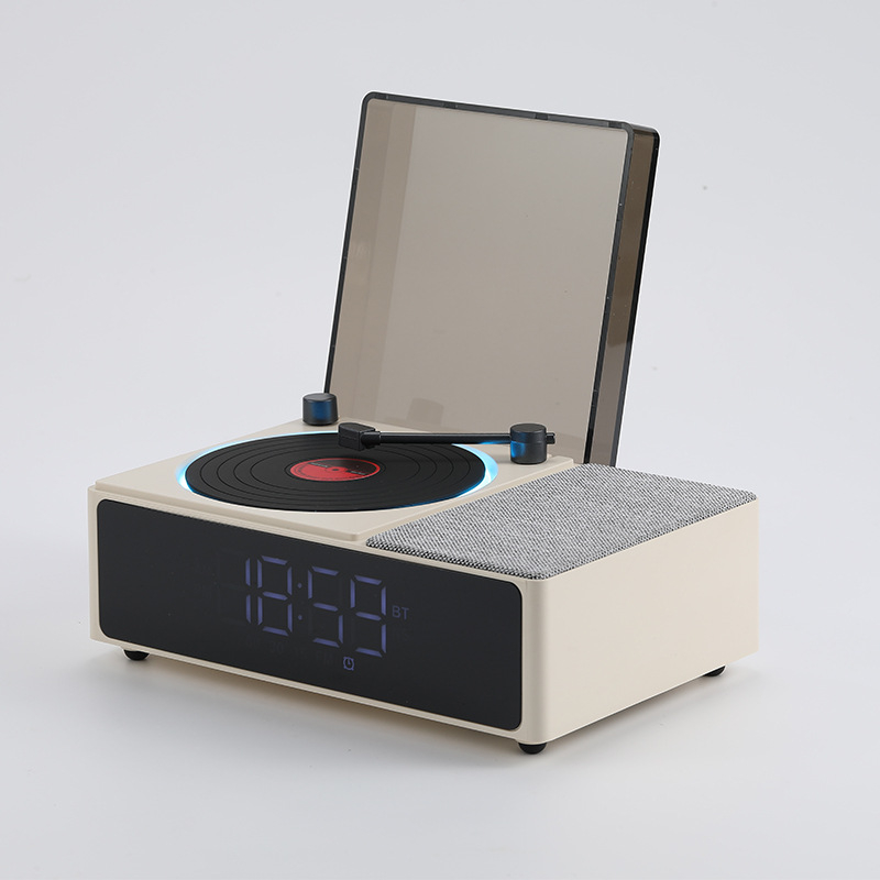 Vinilni player s Bluetooth zvučnikom i budilicom, USB napajanje, frekvencijski odziv 100 Hz–20 kHz, SNR ≥70 dB, IPX7 vodootpornost, ugrađena baterija 300–500 mAh