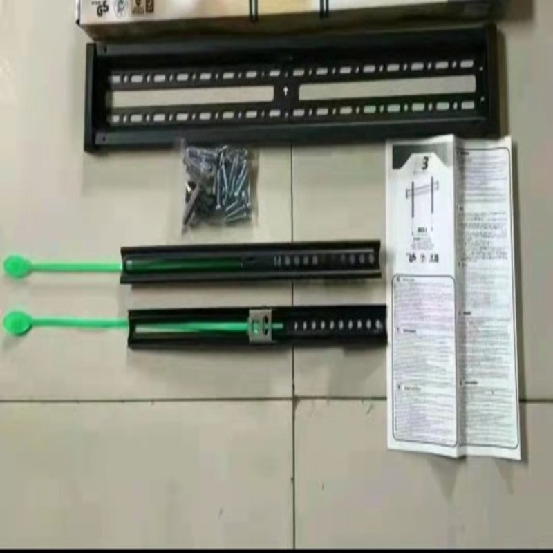 TV‑fali tartó lengő és teleszkópos beállítással, vas keret, mechanikus vezérlés, teherbírás több mint 15 kg