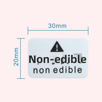 Inštruktážna nálepka s varovaním pre nejedlé výrobky | Model J2 | Materiály: kraftový papier, krehký papier, PVC samolepiaci, meďová doska samolepiaca | 50 nálepiek na stránku