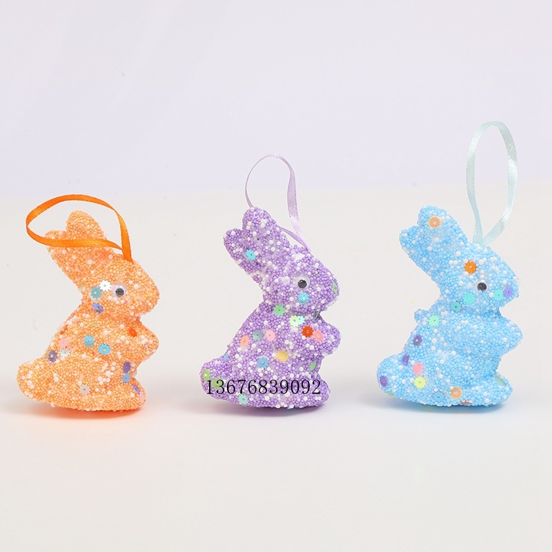 Pjenasti uskršnji ukras jaja s motivom zeca i šljokicama; Materijal: pjena; Kategorija: uskršnje jaje; Nije uvezeno; Bez IP ovlašćenja.