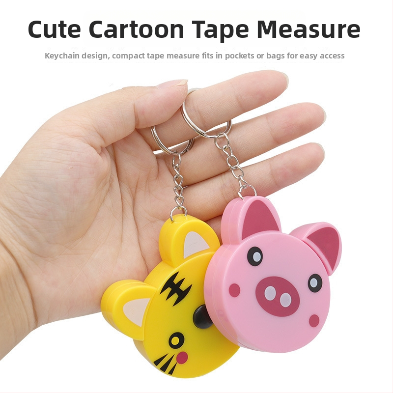 Mjerna vrpca s privjeskom, crtani životinjski motiv, dvostruka skala, automatsko povlačenje