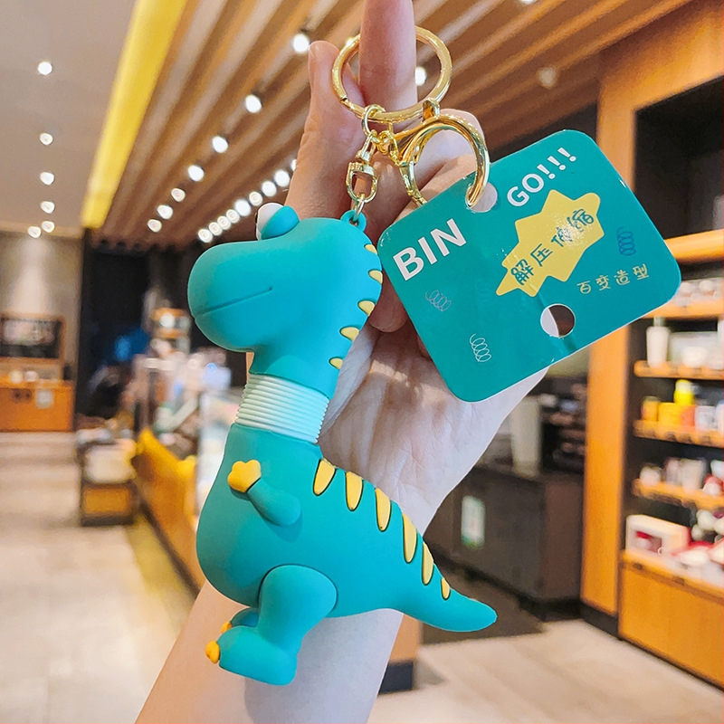 Ключодържател динозавър с прибираща се шия (PVC + сплав; самостоятелна опаковка; сладък стил)