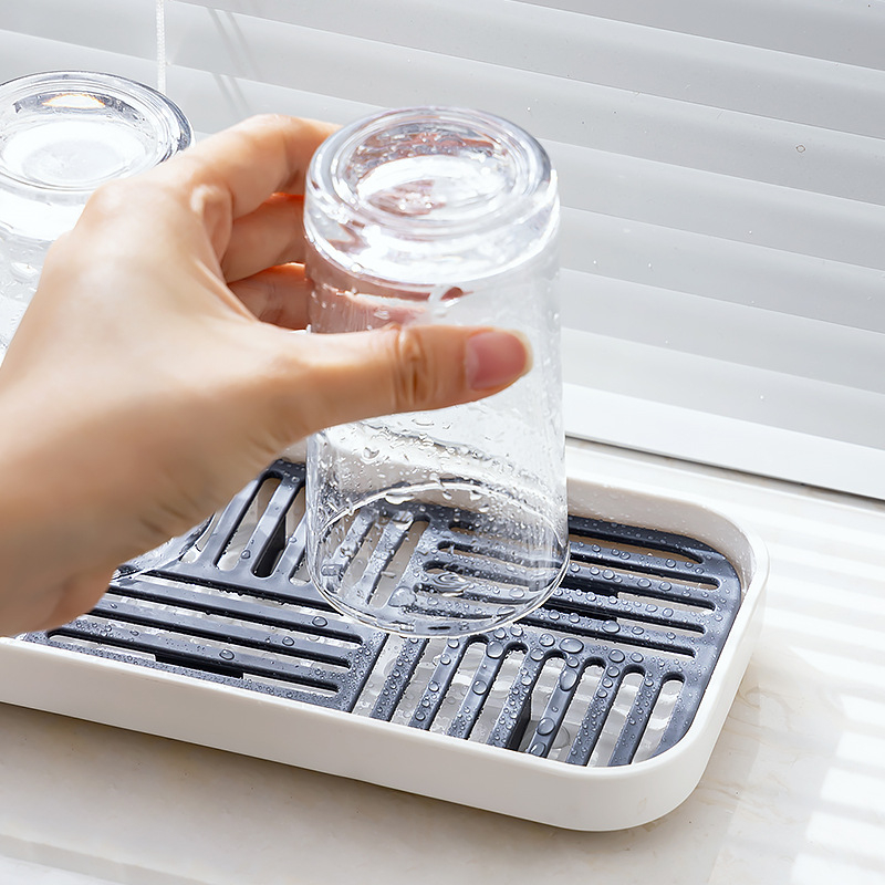 Bočni odvodni kut za sudoper, uski i dugačak, za spužice, krpe i posuđe, plastičan, pomični, bez ugradnje, moderni minimalistički stil