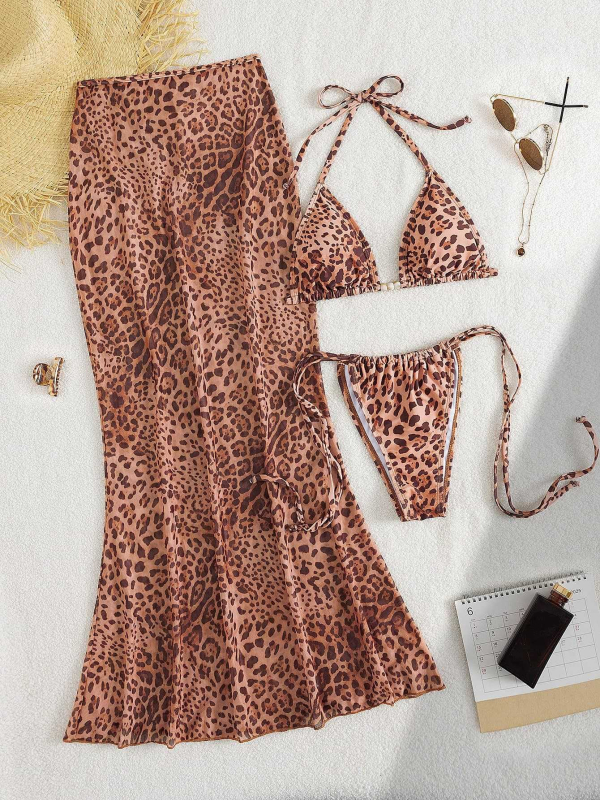 Trokomponentni leopard print bikini set: trokutasti gornji dio s umetkom, prozirna duga suknja, materijal poliester/elastan 82/18