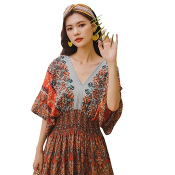 Középhosszú A-vonalú boho strandruha, nyomtatott poliészter anyagból, kerek nyakú, ujjatlan