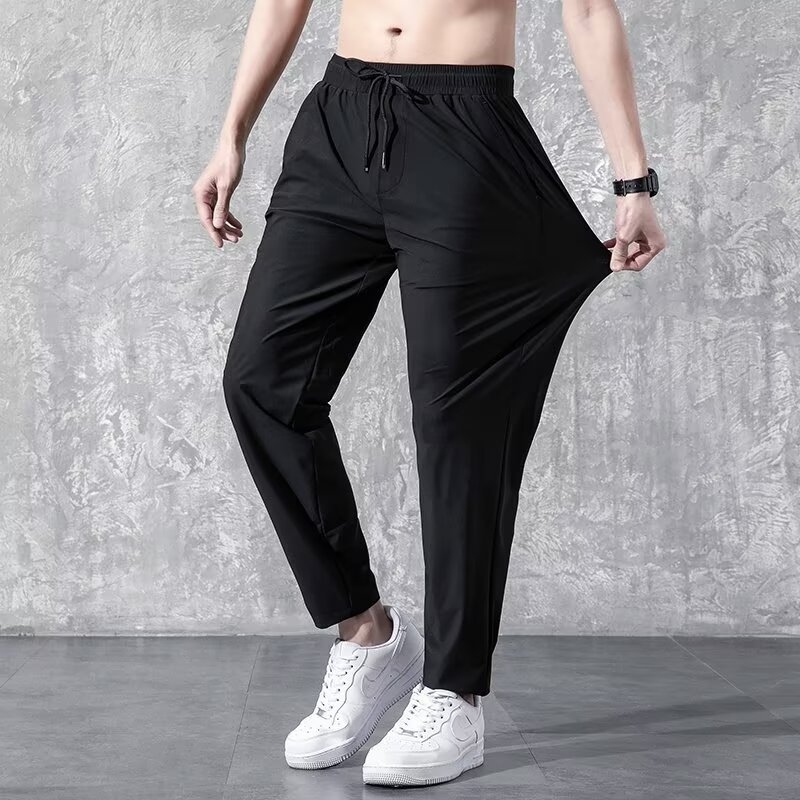 Pantaloni sport casual pentru bărbați - croială lejeră, lungi, talie cu șnur, amestec poliester-bumbac, fără cute