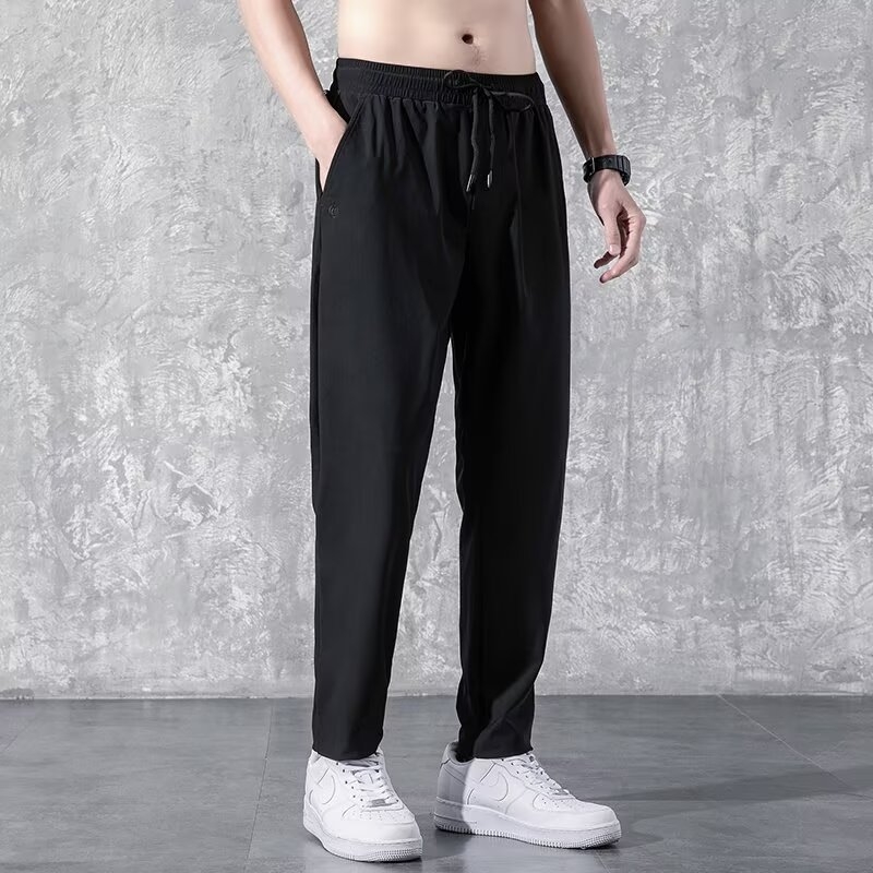 Pantaloni sport casual pentru bărbați - croială lejeră, lungi, talie cu șnur, amestec poliester-bumbac, fără cute