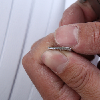 PP ručna pakirajuća traka - Materijal: PP; Debljina: 1.5 mm; Model: DL-SPP-10; Naprezanje pri rastezanju: 80 kg