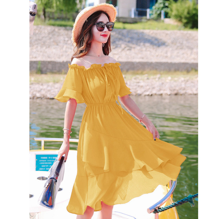 Midi ruha váll nélküli, fodros pántokkal és lotusleveles alakú ujjakkal, elasztikus derékrész, TR anyag.