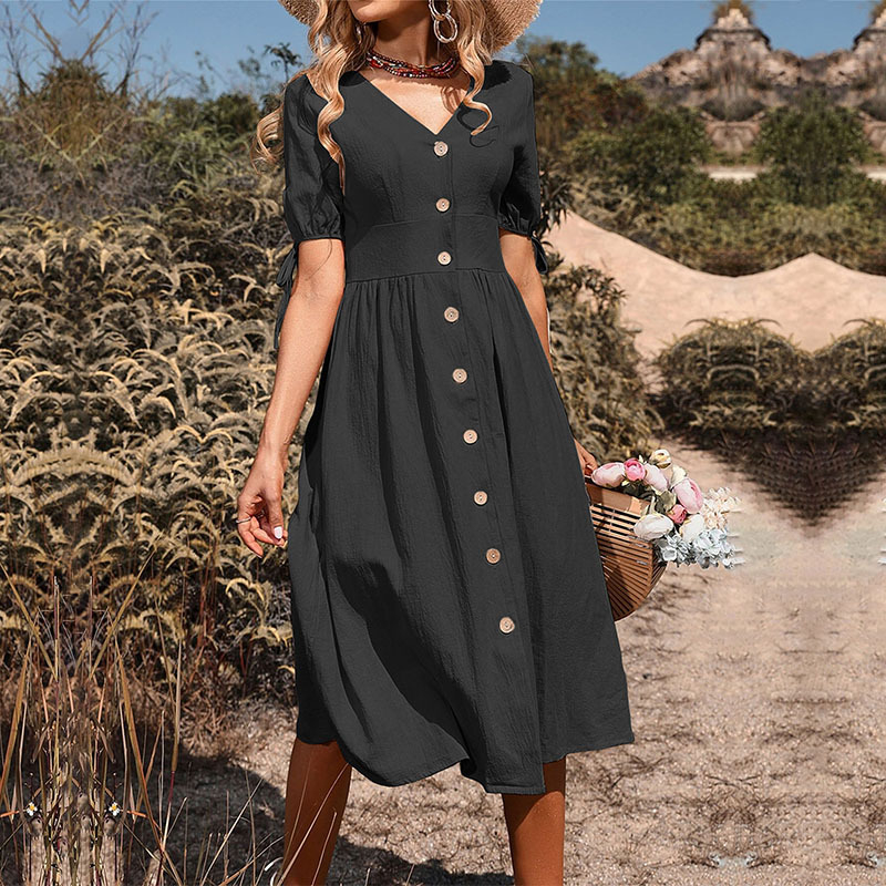 Rochie midi A-line cu decolteu în V, mâneci scurte, talie înaltă; material poliester cu elastan; model monocrom.