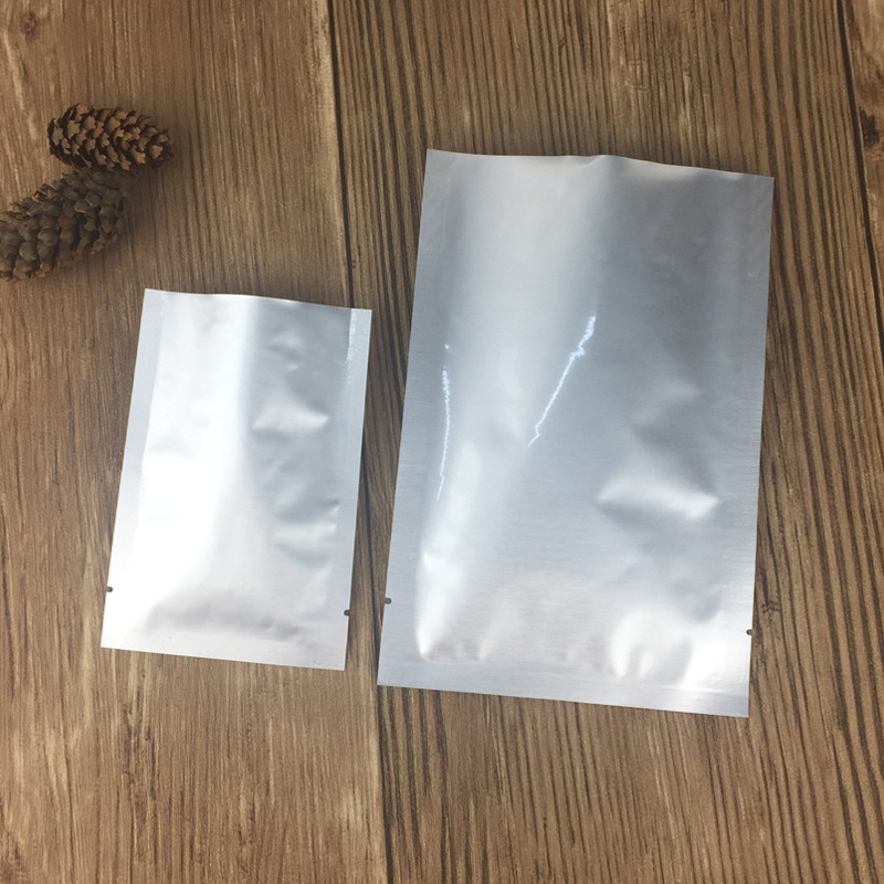 Aluminijska vakuumska torbica s trostrukim zatvaranjem za opću pakiranje; dnevni kapacitet 100000