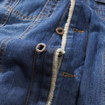 Pamutból készült mellény fleece béléssel, lazán szabott, több zseb, egyszínű minta, tavasz–őszre