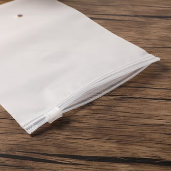Pungi EVA cu fermoar pentru haine și șosete – pungi din plastic transparente pentru îmbrăcăminte cu logo imprimat (Brand: To Lin; Grosimea dublă a stratului: 14; Producție zilnică: 50.000)