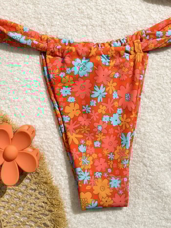 Kétrészes bikini szett - virágmintás, hátrész nélküli, mellkas párnával, magas rugalmasság, ujj nélküli; poliészter 82% és spandex bélés, 137 g