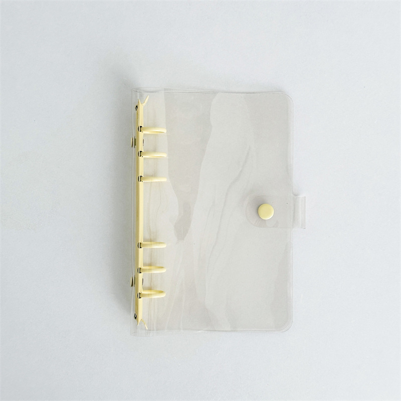 Bilježnica s prozirnim PVC omotom, veza s slobodnim listovima, zamjenjive unutarnje stranice, unutarnji materijal: sirov drveni celulozni pulpa, težina papira 80 g/m², stil: japansko-korejski sladak.