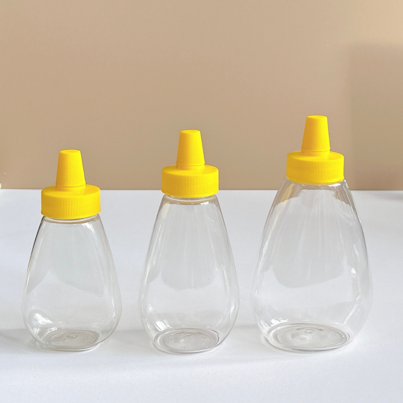 Бутилка за мед с фен-образно изцеждане и силиконов вентил, PET пластмаса, модел GF064, Yi Rui