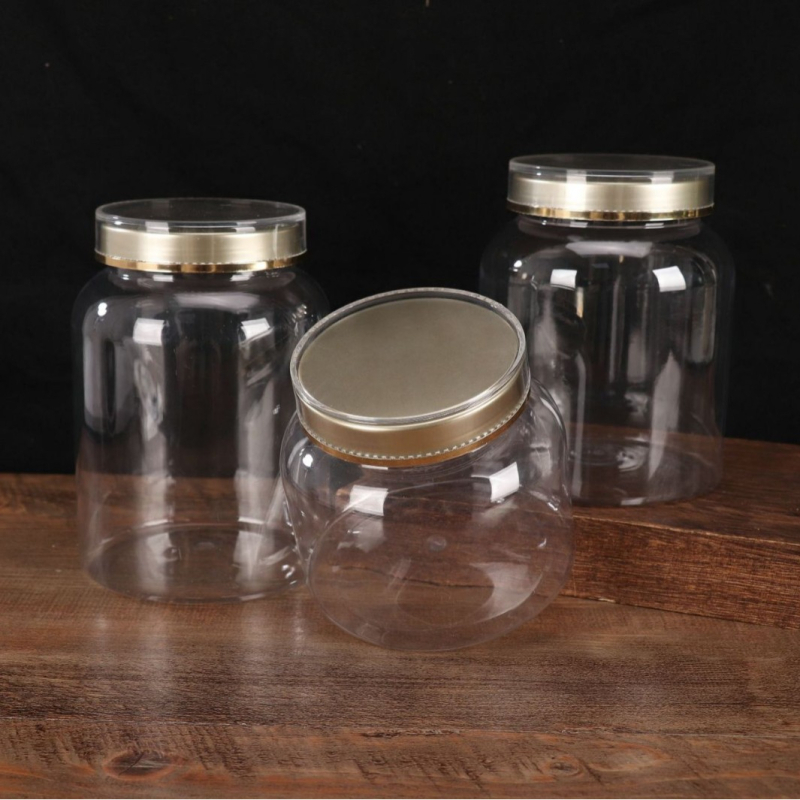 Műanyag kör alakú üveg fedővel, átlátszó adagoló üveg, PE anyag, szitanyomás, testreszabás