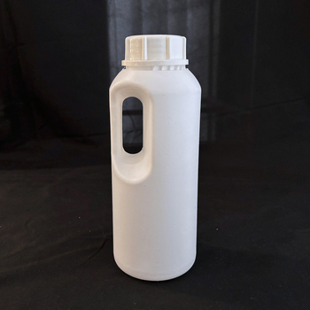 PP műanyag kerek üveg tejitalokhoz, 900 ml űrtartalom, külső kupakkal.