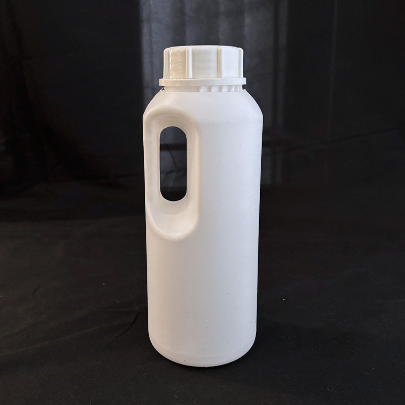 PP műanyag kerek üveg tejitalokhoz, 900 ml űrtartalom, külső kupakkal.