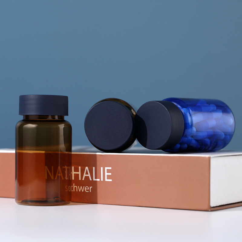 Széles szájú PET tablettás üveg csavaros kupakkal, átlátszó műanyag palack, fúvott formázással készült, logóval testre szabható