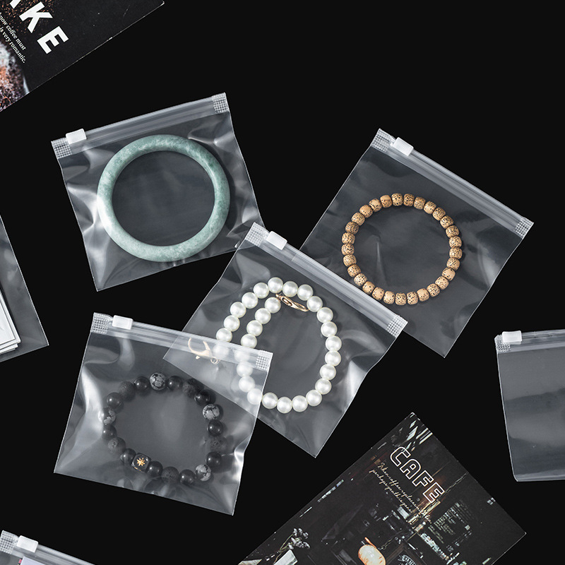 Pungă cu fermoar din PE, finisaj mat, auto-etansă, pentru depozitare haine și accesorii, ambalaj de 50 bucăți