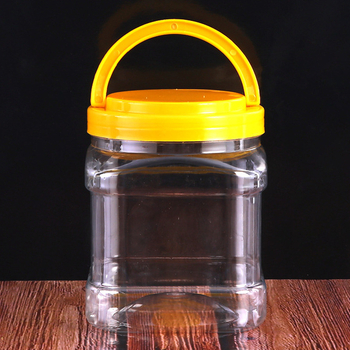 Kvadratni PET spremnik za med s ručkom, čvrst plastični kućište, zatvorena ambalaža